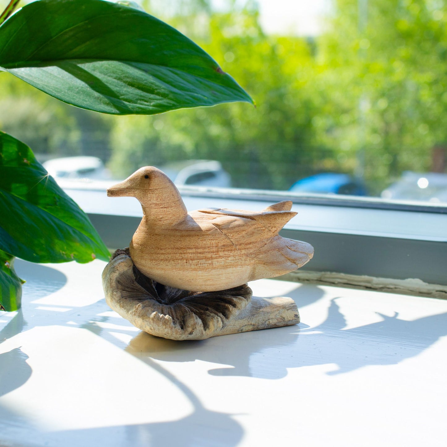 Hand-Carved Duck on Parasite Wood Base Decor Sculpture